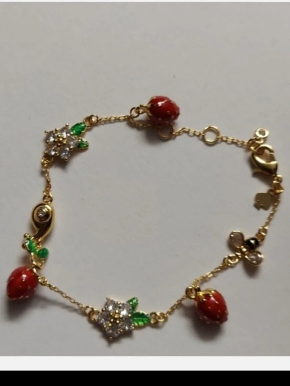kate spade Gold-Tone Strawberry Charm Bracelet with Red and Green Accents - Picture 6 of 8